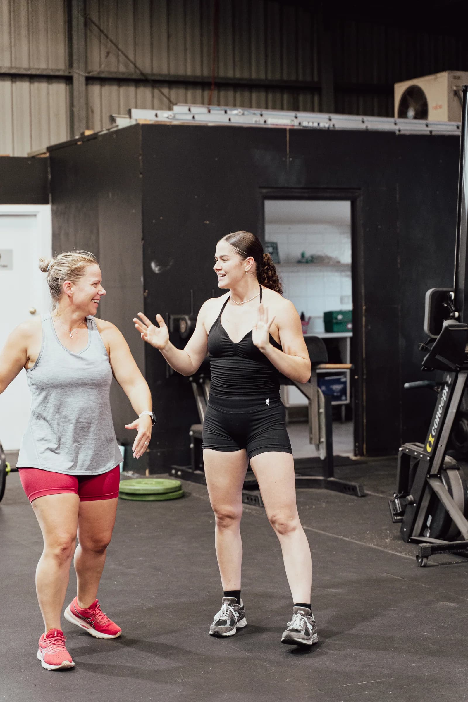 Two WITHIN members smiling together after a Functional Fitness session